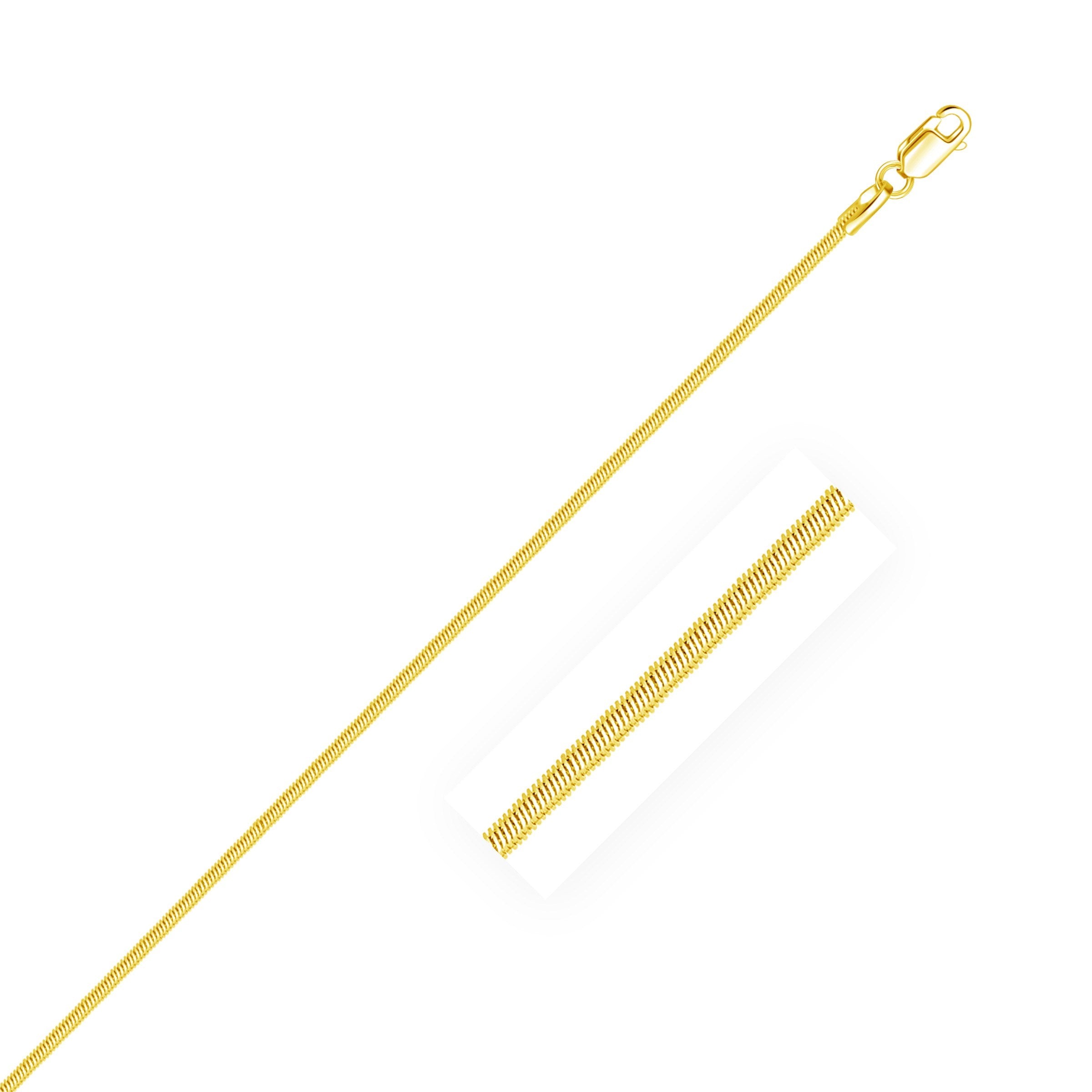 1.0mm 14K Yellow Gold Octagonal Shiny Snake Chain in a sleek high-contrast midnight luxury editorial style